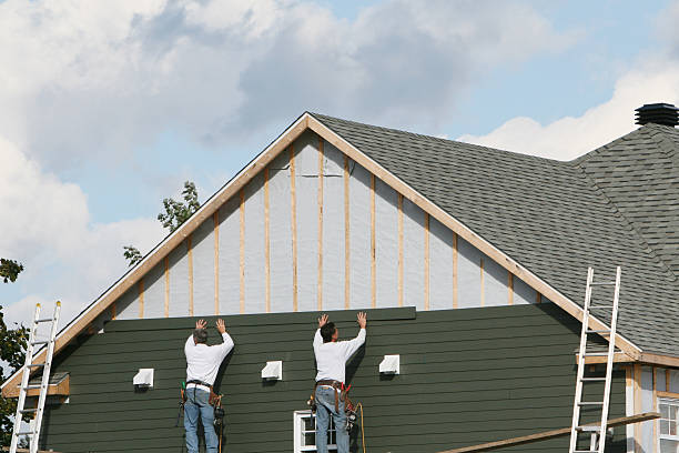 Professional Storm Damage Siding Repair technician working in Black Diamond, FL